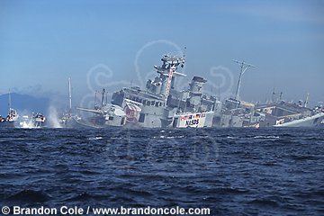 lm6120. HMCS Saskatchewan sinking. Intentionally scuttled to create an artificial reef for scuba divers. Nanaimo, British Columbia, Canada.